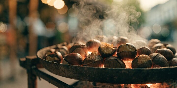 Fresh delicious chestnuts roasting on a traditional hot charcoal grill during a cozy autumn day to celebrate the harvest season