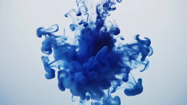Shimmering Blue Ink Cloud Blooms in Clear Water Slow Motion Footage Flowing Toward Calm and Creativity Perfect for Beauty Advertising and Cosmetic Presentations