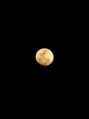 Full moon glowing in the dark night sky with copy space.  © Ahmadabdurropiq