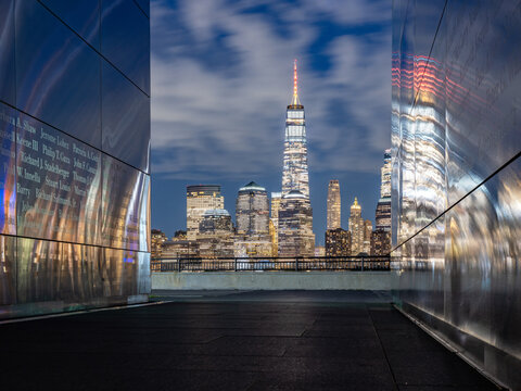 Celebrating America 250 years, Empty Sky 9/11 Memorial at Dusk leading toward One World Trade Center and the New York City skyline, Liberty State Park, Jersey City, New Jersey, USA.