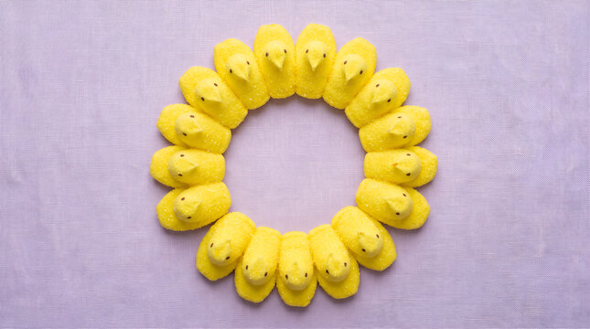 Yellow easter peep marshmallow candies arranged in a circular wreath