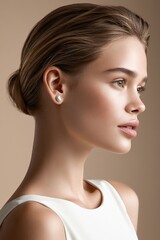 Fototapeta premium Elegant Woman with Natural Beauty and Pearl Earring in Soft Light Portrait