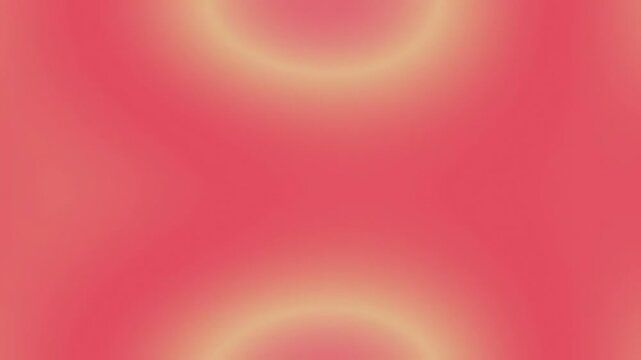 Abstract soft gradient background with warm pink and golden yellow tones.