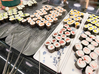 Assorted sushi maki rolls ready for selection © alenagurenchuk