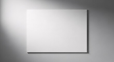 Fototapeta premium Minimalist blank white rectangular canvas mounted on smooth gray wall for modern interior design or art display with clean aesthetic and versatile use