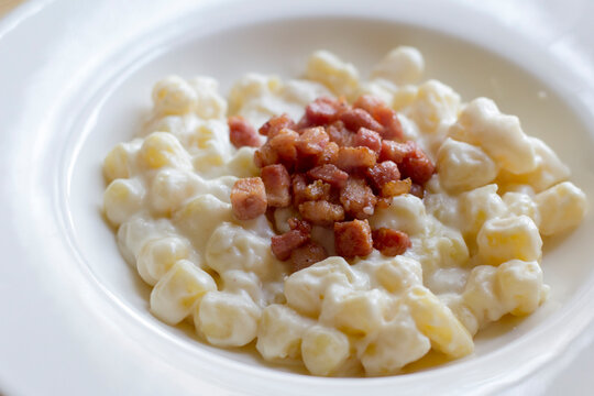 Slovak National Dish Bryndzove Halusky with Fried Bacon