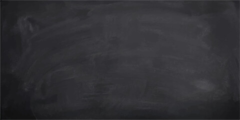 Blank blackboard with chalk smudges during a lesson with copy space for text © Anamika