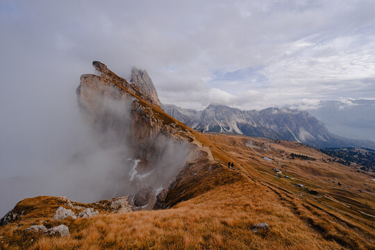 Scenic landscape view of the Dolomites Alps featuring the Odle mountain range and Seceda peak in Italy. Captures dramatic alpine scenery,