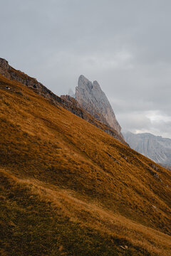 Scenic landscape view of the Dolomites Alps featuring the Odle mountain range and Seceda peak in Italy. Captures dramatic alpine scenery,