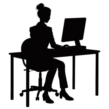 Businesswoman works at a modern office desk using a desktop computer in a quiet environment.
