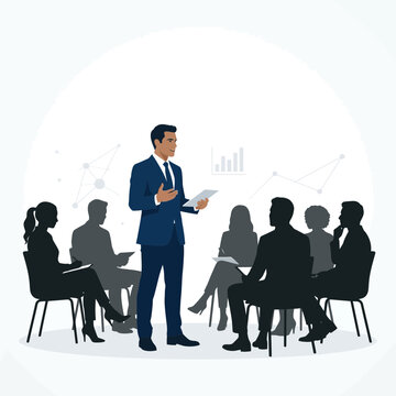 Businessman stands before a seated team to present a professional corporate strategy.