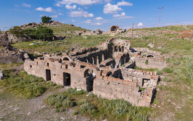 Fototapeta premium Aerial View of Binbir Kilise Ancient Byzantine Ruins in Karaman Turkey with Historic Churches and Karadag Mountain Landscape