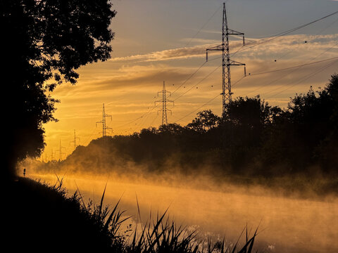Misty Sunrise Over River Canal with Power Pylons at Dawn &ndash; Brecht, Belgi&euml;