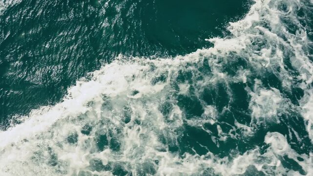 Epic sea water foam ocean waves texture background horizontal cruise ship boat wake.
