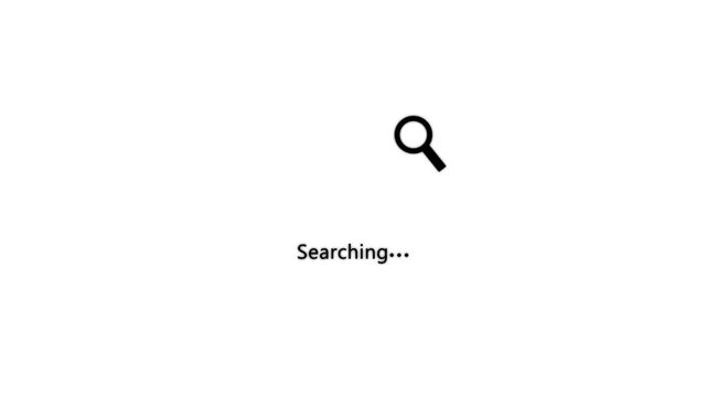 A black magnifying glass icon appears centered on black screen with searching written below it to denote an active information scan