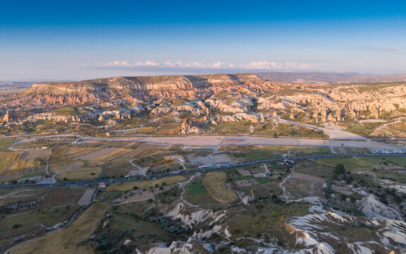 Aerial View of Uchisar Castle and Goreme Landscape in Cappadocia Nevsehir Turkey with Fairy Chimneys and Volcanic Rock Formations