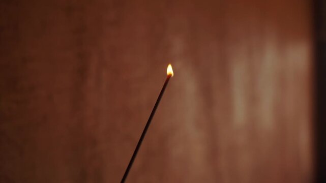 Hand lighting incense stick with lighter