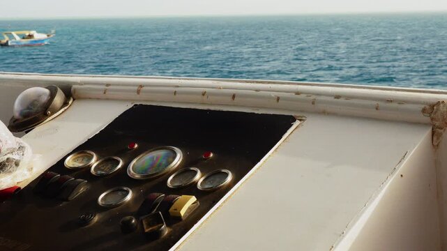 Epic marine boat control dashboard panel gauges texture background sea view horizon.
