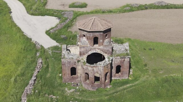 Drone Footage of Kizil Kilise in Guzelyurt Aksaray Turkey Showing Early Christian Red Stone Church and Anatolian Landscape