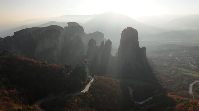 Cinematic Aerial View of Meteora Rock Formations and Historic Monasteries