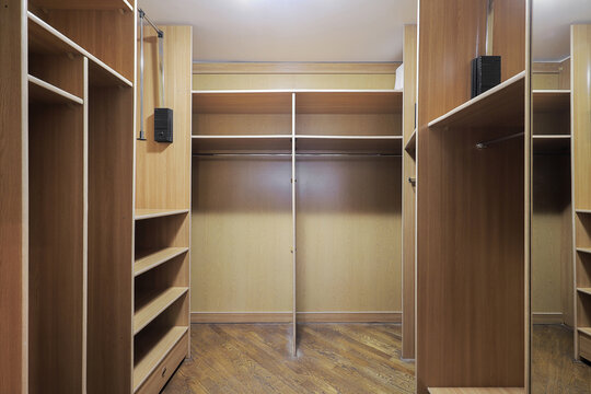 Wardrobe with shelves in the dressing room