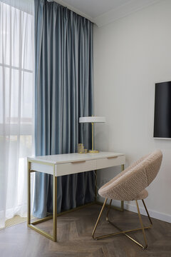 Desk and chair in the room