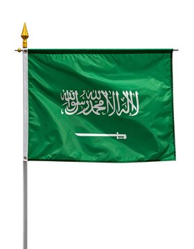 A green flag with white Arabic calligraphy and a sword