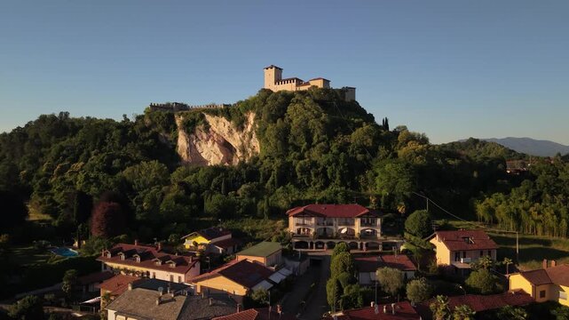 Sunset Drone View of Rocca di Angera Castle on Lake Maggiore