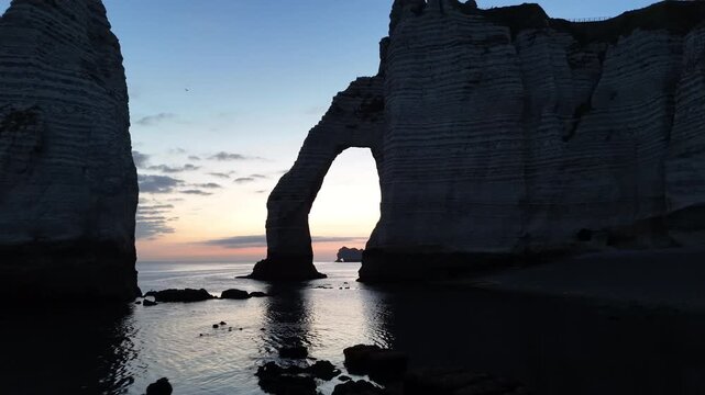 Etretat France sunrise at the natural rock arches and cliffs