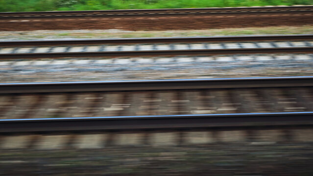 Multiple railway tracks stretching into distance creating a transportation network