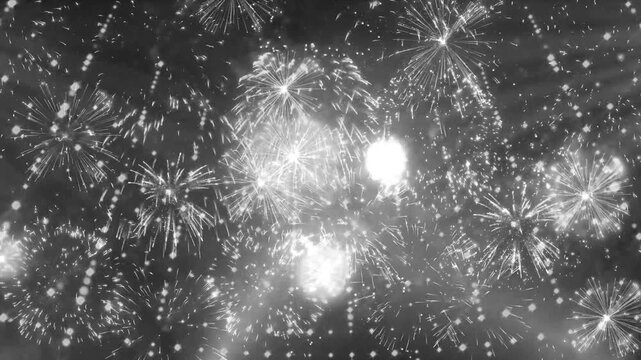 Monochrome background with bright white fireworks exploding and glittering particles filling the entire frame for a dramatic festive celebration. 
