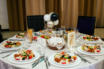 Fototapeta premium Elegant appetizers with gourmet toppings displayed on a white platter