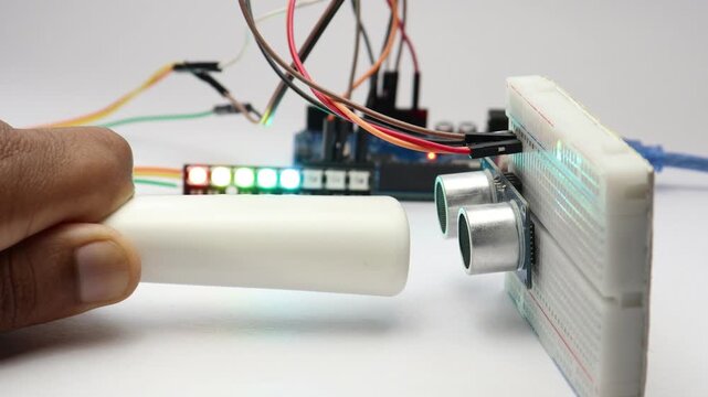 Ultrasonic sensor triggering led strip when obstacle detected, demonstrating sensor module working