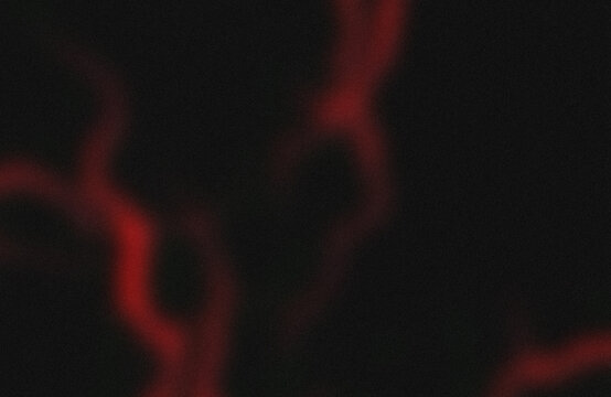 Cosmic red nebula glowing in deep space darkness