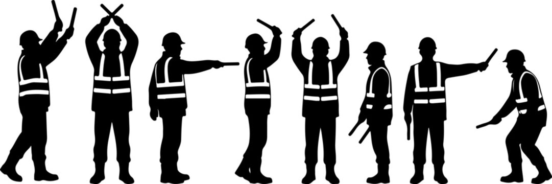 Silhouettes of construction workers with traffic wands vector illustration
