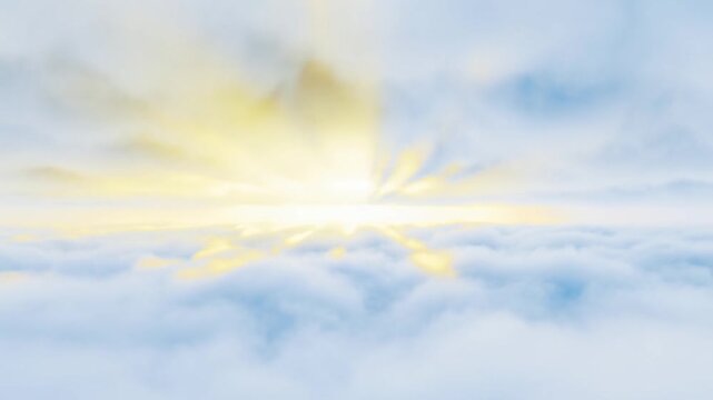 Time lapse sun rising and breaking through soft cloud layers in aerial sky view over horizon at dawn