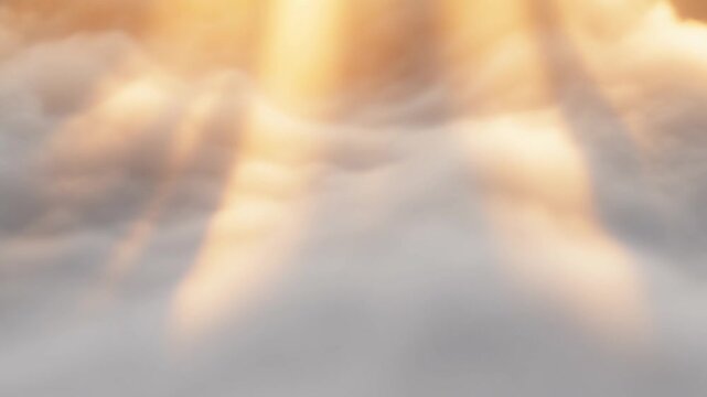 Aerial view sun rays streaming through soft layered clouds at sunrise, slow upward drift revealing golden shafts of light across misty sky