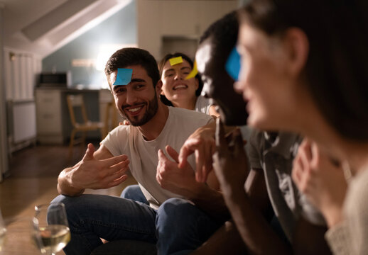 Puzzled man making guess during game