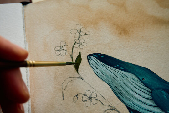 The artist painting a whale