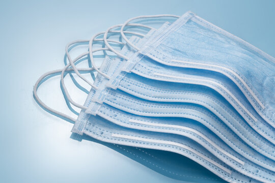 Stack of Blue Surgical Masks with Elastic Ear Loops