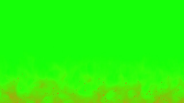 Dynamic fire overlay effect with glowing embers rising against a bright green chroma key background for professional video editing and visual effects compositing projects
