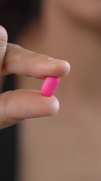 close up woman hand holding a medicine. Stop drug use Taking Medication Caring for the health care medical concept.