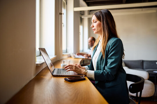 Woman works in a contemporary workspace