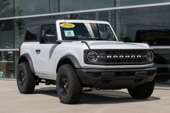 Ford Bronco Base 2-Door 4X4 at a dealership. Ford offers the Bronco with a 2.3L EcoBoost I-4 engine. MY:2026