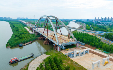 Fototapeta premium Tongshun Bridge Construction Across Yangtze River, Wuhan China