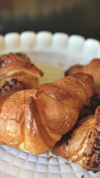 Assorted cornetti displayed for breakfast with crispy layers and gourmet presentation