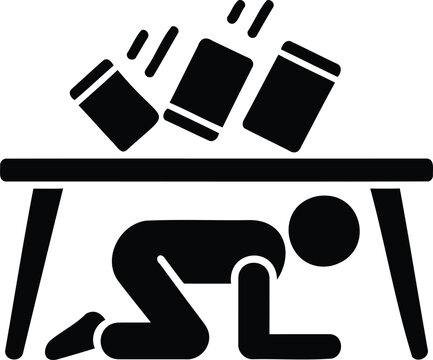 Person hiding under table from falling objects during earthquake  safety concept
