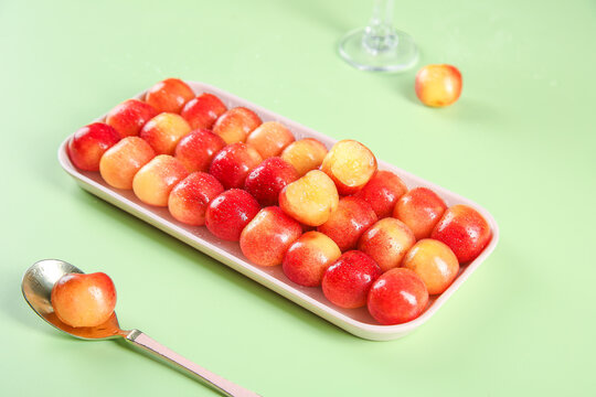 Fresh Golden Red Rainier Cherries on White Tray Premium Chilean Imported Fruit