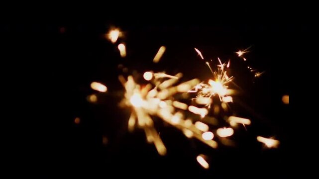 Firework home sparkling celebration lights illuminating festive holiday night atmosphere