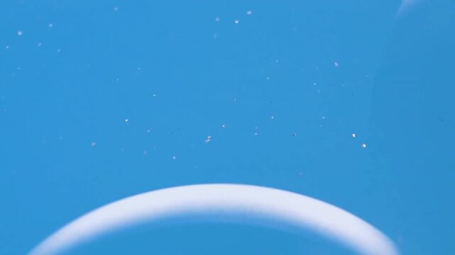 Super moon glowing celestial horizon beneath peaceful cosmic blue sky